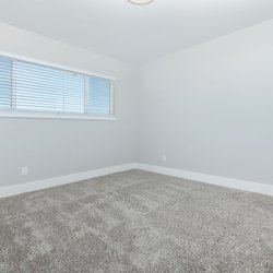 Secondary carpeted bedroom at Carlson Apartments, located in Colorado Springs, CO